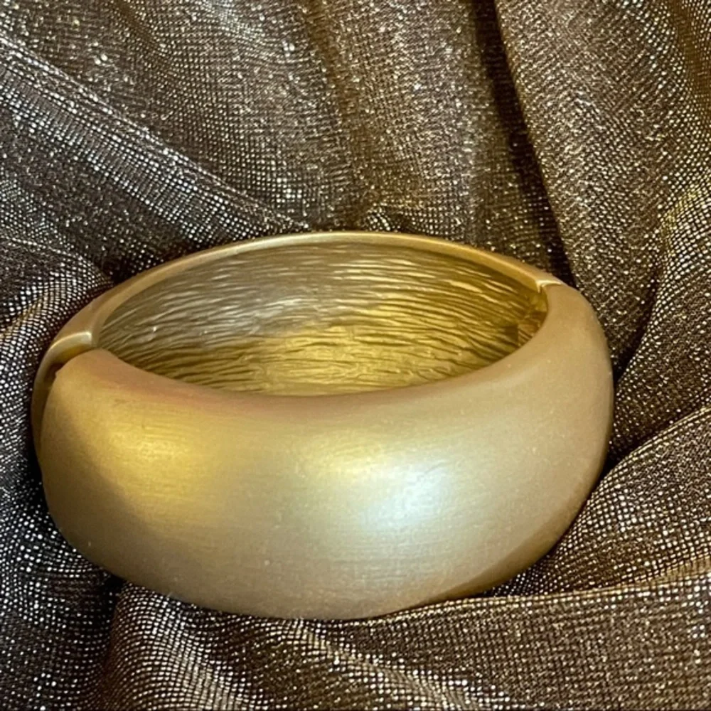 Kenneth Jay Lane satin gold bangle hinged domed